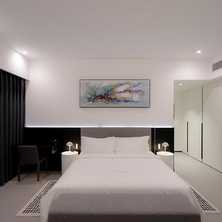One Riviera Hotel And Residences Ban Souanmone Екстер'єр фото
