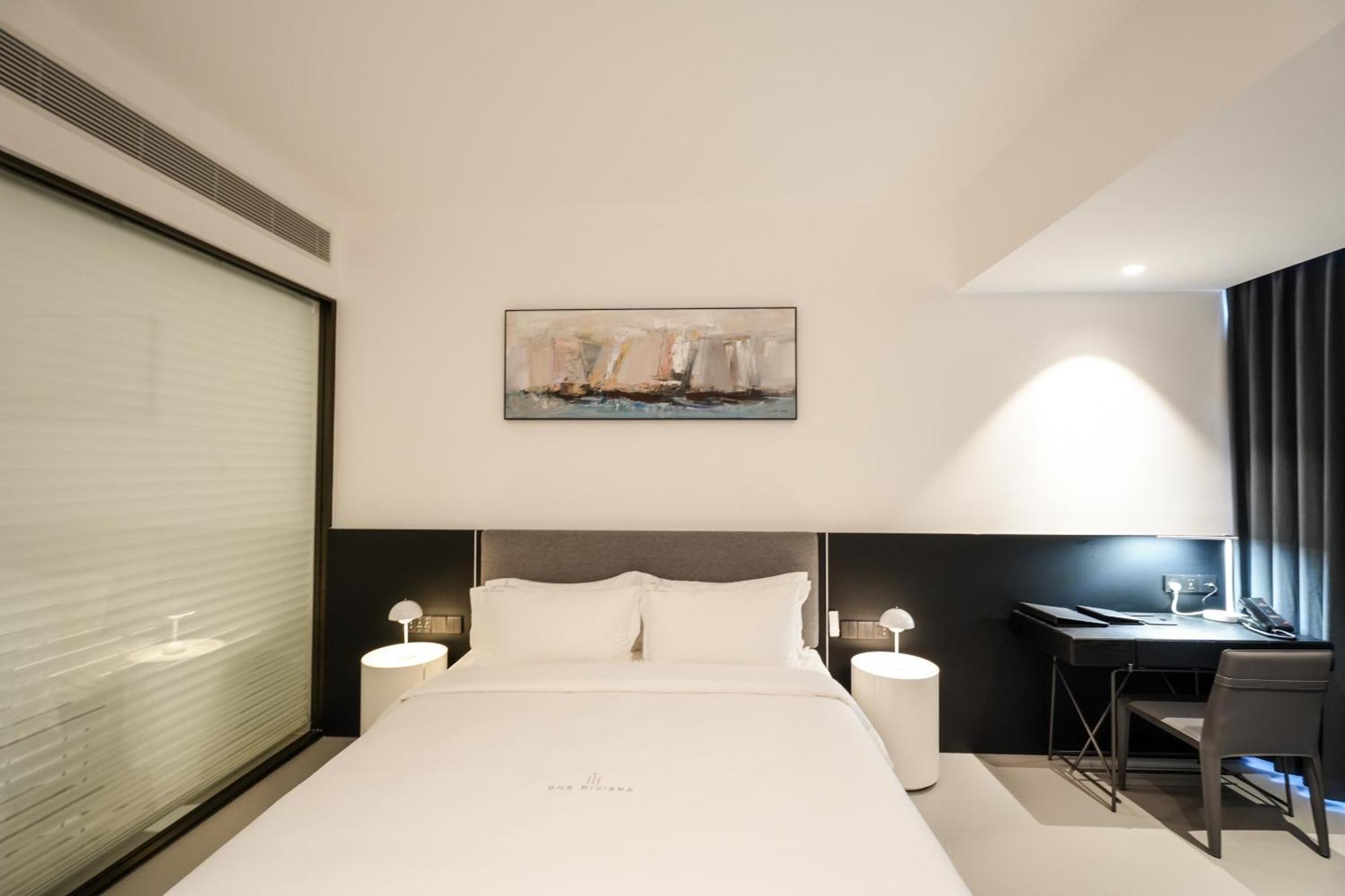 One Riviera Hotel And Residences Ban Souanmone Екстер'єр фото