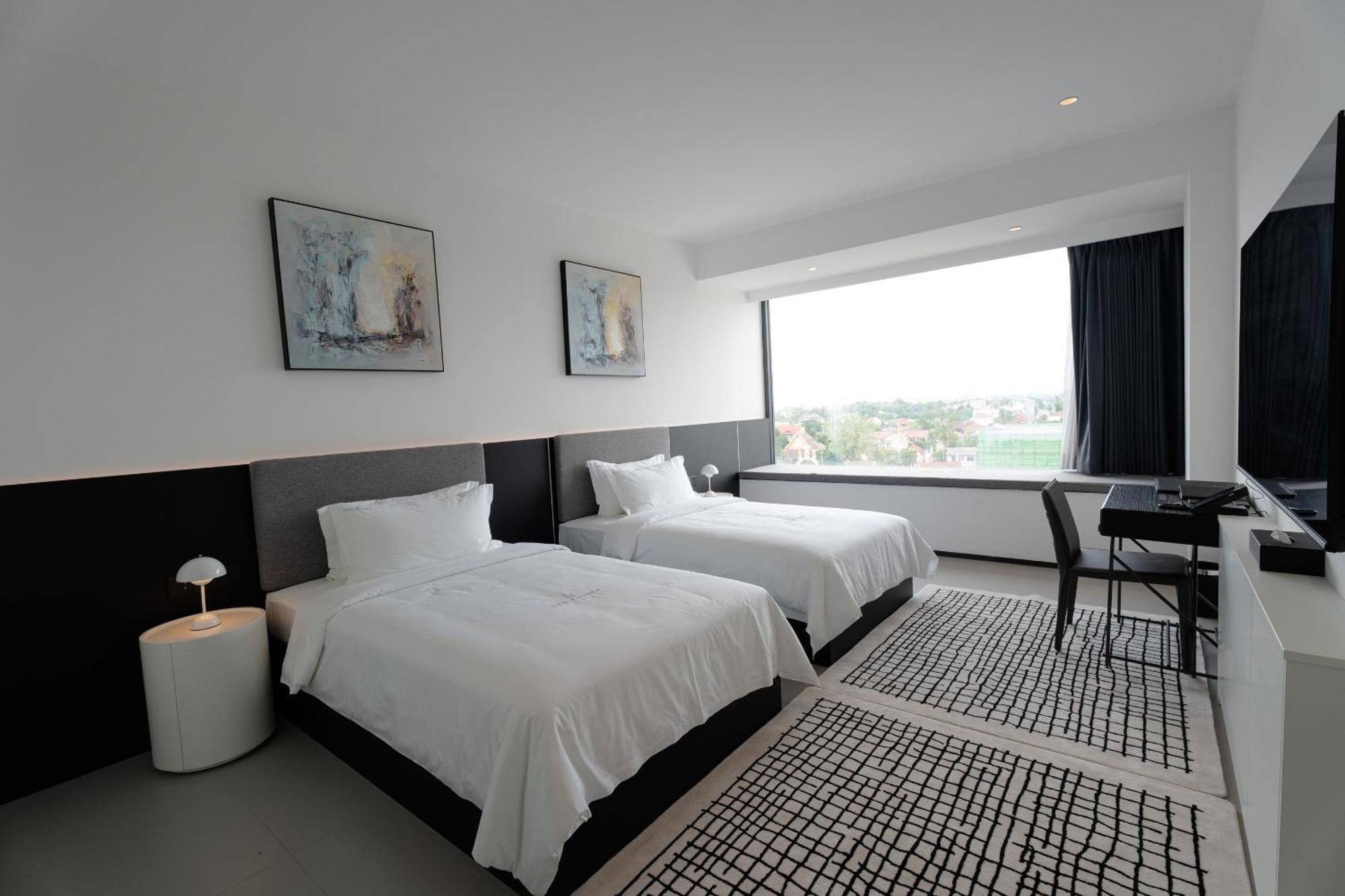 One Riviera Hotel And Residences Ban Souanmone Екстер'єр фото